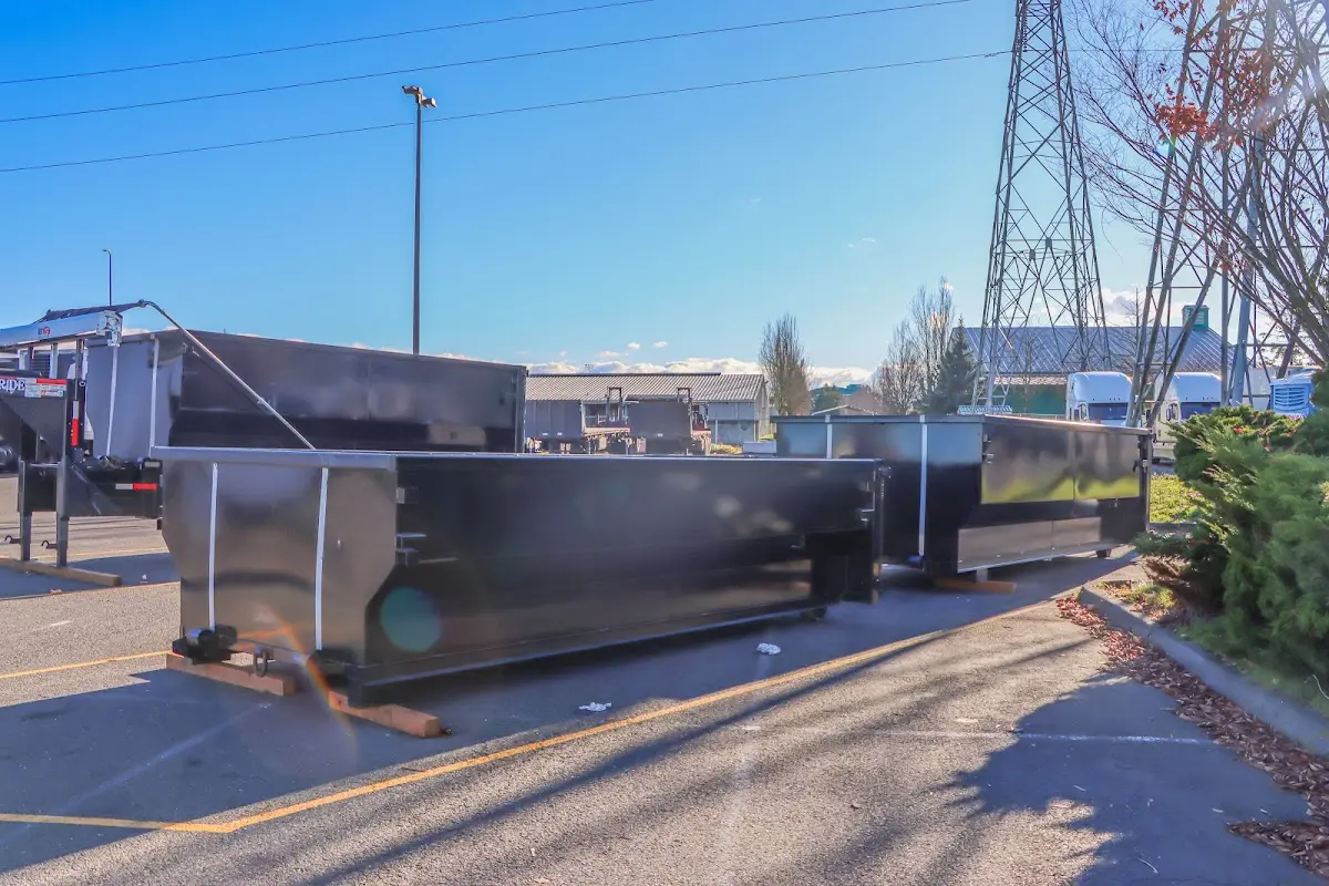 Roll-off dumpster ready for waste disposal at job site for 6 Yard Dumpster Rental in Murillo